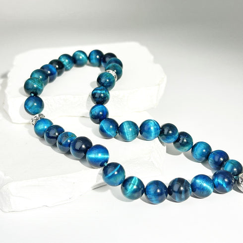 Elegant misbaha prayer beads made from natural blue tiger's eye stone - 33 beads with a diameter of 10 mm - handwoven and precisely designed by the most skilled artisans