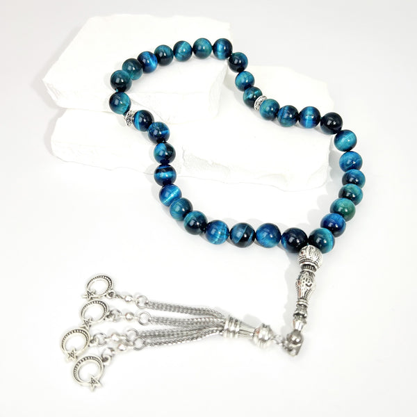Elegant misbaha prayer beads made from natural blue tiger's eye stone - 33 beads with a diameter of 10 mm - handwoven and precisely designed by the most skilled artisans