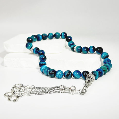 Elegant misbaha prayer beads made from natural blue tiger's eye stone - 33 beads with a diameter of 10 mm - handwoven and precisely designed by the most skilled artisans