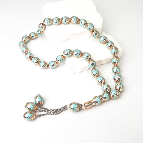Islamic Architectural Design in Gold Plating - 33 beads - Light Blue color - 12x14 mm